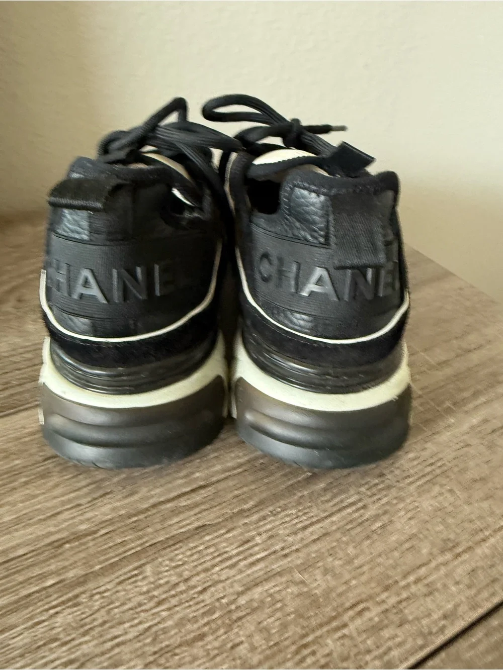 CHANEL Black and White Interlocking CC Runner Sneakers